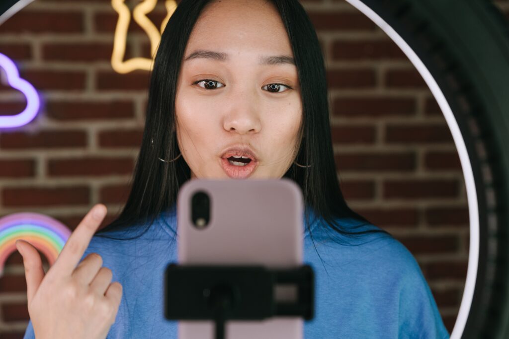 Female Influencer shooting a reel for her audience.