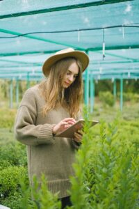 Photo by Anna Shvets: https://www.pexels.com/photo/young-female-gardener-browsing-tablet-for-work-in-farm-5230961/